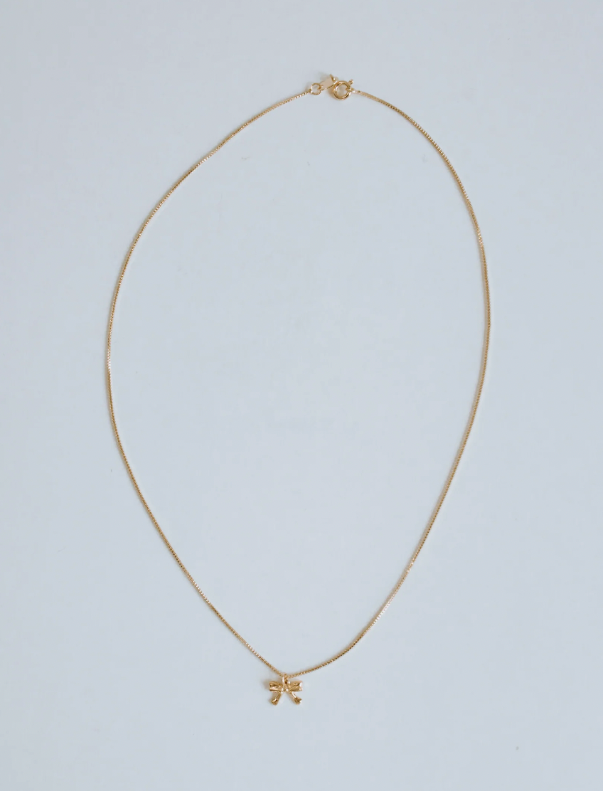 Gold bow necklace